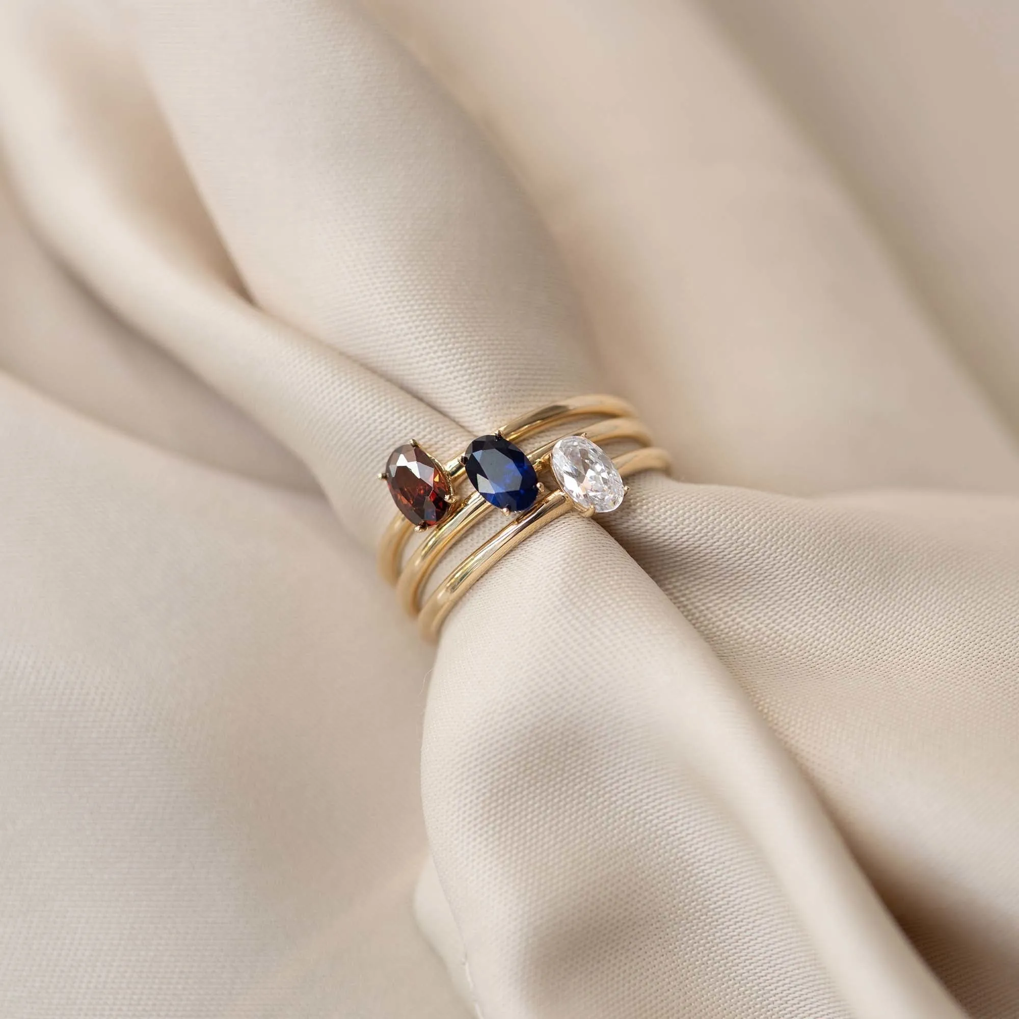 Baguette Nila 14 karat gold ring with blue zirconia stone