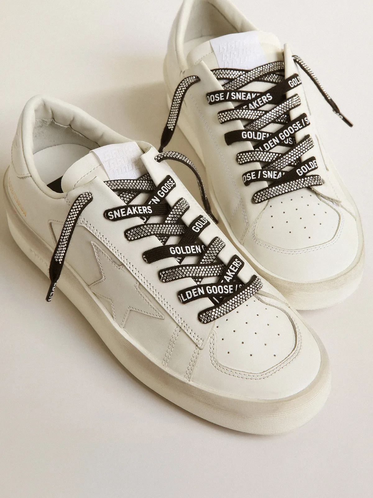 Black laces with Swarovski rhinestones and contrasting white ‘Golden Goose Sneakers’ lettering