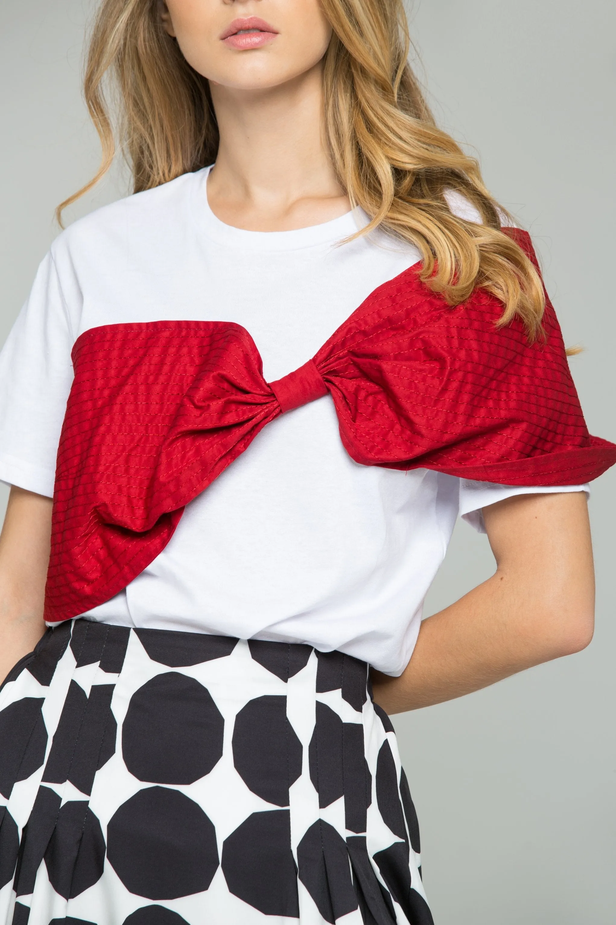 Red Crepe Textured Fabric Bow Over White T-Shirt